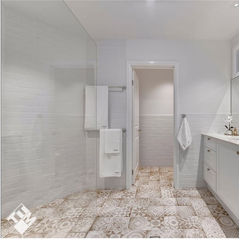 Patterned encaustic floor run through to the shower — bathrooms & ensuites in Brisbane by Torrisi Tiling