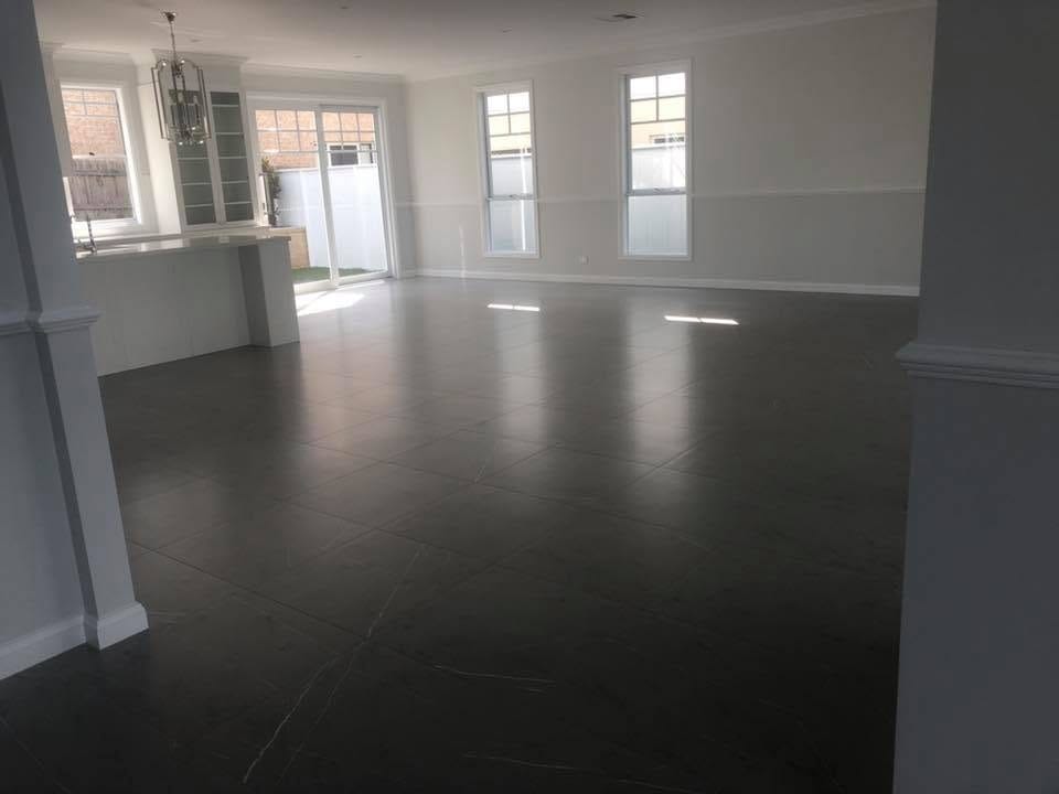 Dark large-format tile through open living — tiling by Torrisi Tiling near Mitchelton, Brisbane