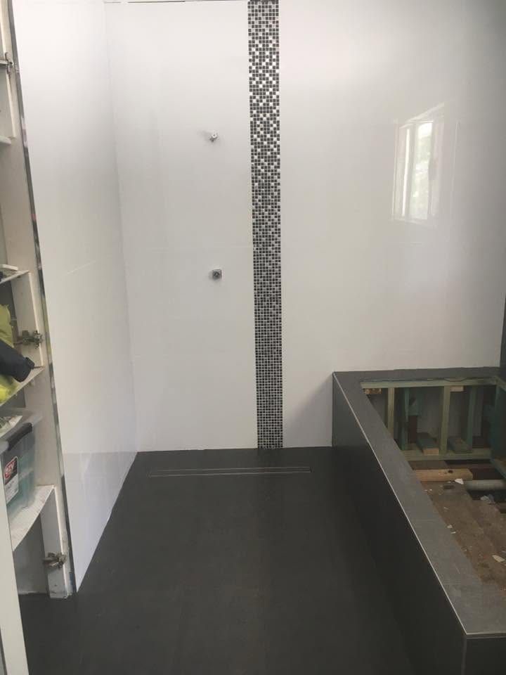 Shower niche with mosaic feature strip — tiling by Torrisi Tiling, Brisbane