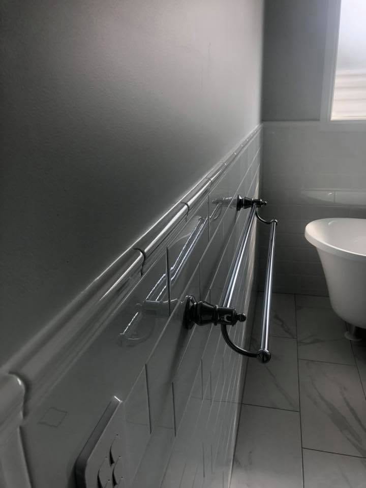 Tiled ramp with stainless handrail — outdoor & pool surrounds in Brisbane by Torrisi Tiling