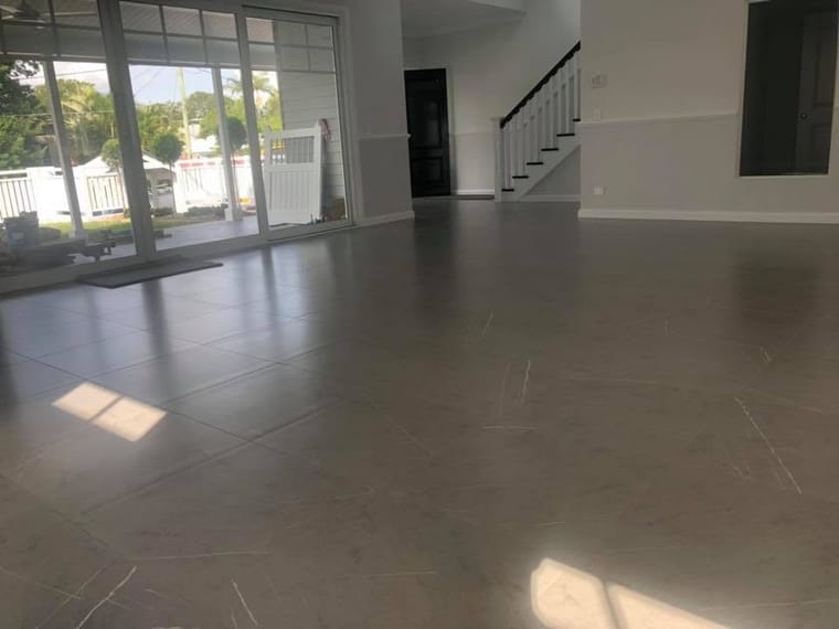 Large-format grey floor to the stair edge — wall & floor tiling in Brisbane by Torrisi Tiling