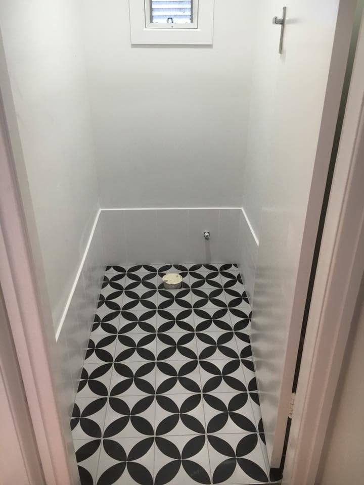 Patterned tile risers up a staircase