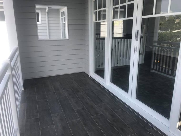 Verandah floor through to French doors — tiling by Torrisi Tiling, Brisbane