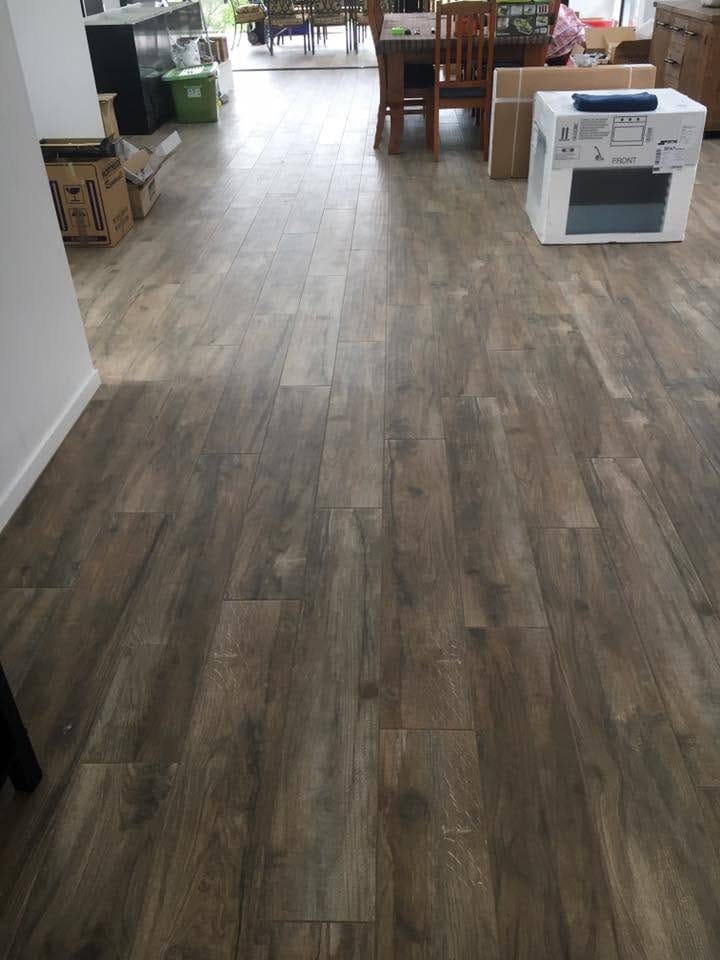 Plank tile through a commercial fit-out — tiling by Torrisi Tiling, Brisbane